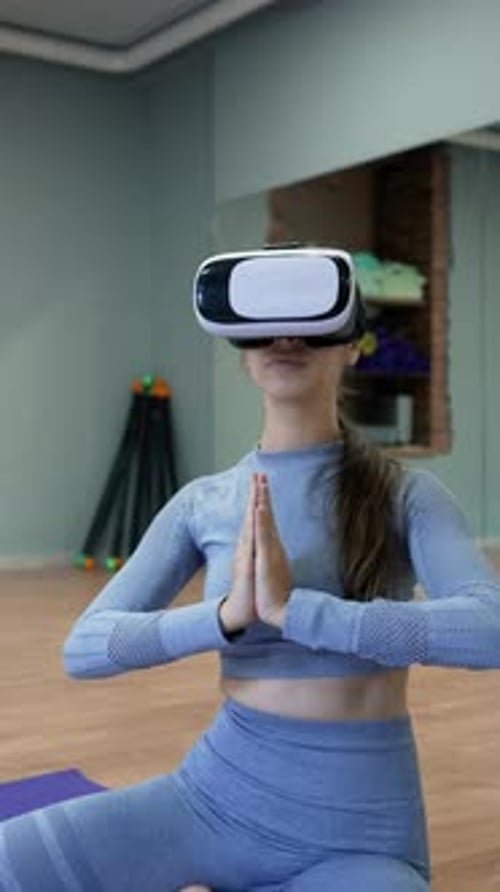 Woman Wearing VR Headset Practicing Yoga