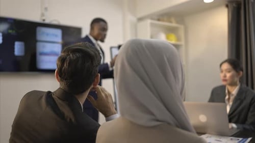 Multiethnic group of business people working together in a modern office