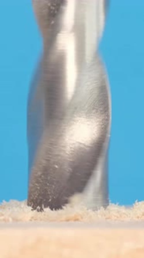 Drill Bit Drilling Into Wood, Close Up