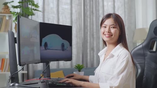Woman Works at Computer on Car Design Project