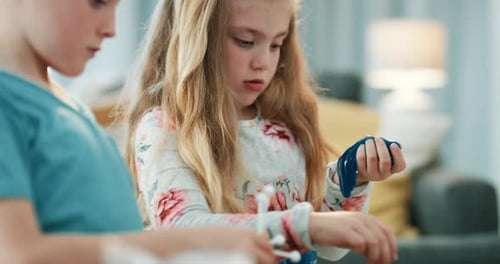 Children Playing with Chemistry Model and Slime at Home