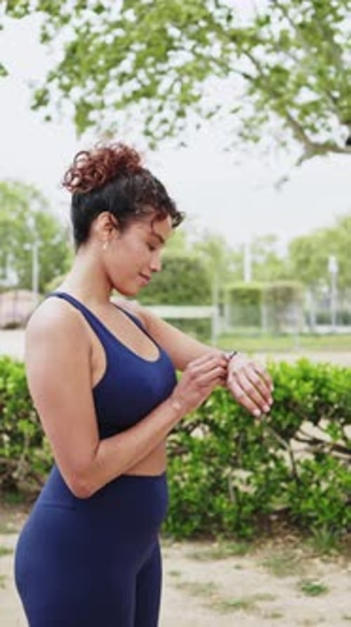 Young sporty woman starting running in slow motion