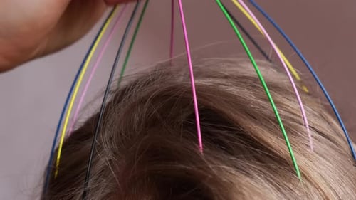 Unrecognizable Woman Enjoying Scalp Massage Through Massager at Home Close Up of Using Scalp
