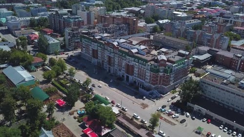 Top view of buildings in city on sunny summer day