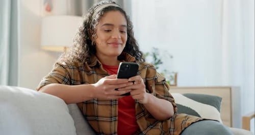 Home cellphone, relax and happy woman typing email, social network post or texting web user