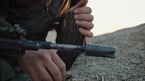 Close-up Shot of Reloading Assault Riffle