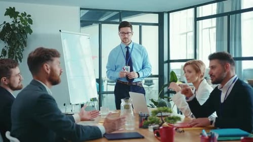 Business Team Meeting Presentation Around Table Indoors