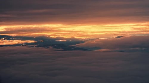 Sunset And Clouds Uniting In The Himalayas
