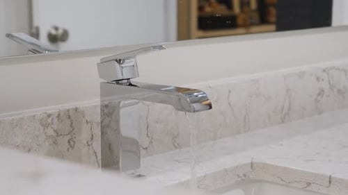 Descending along the water path in a newly remodeled modern luxury bathroom.