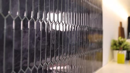 Shiny dark blue tiles in a renovated home