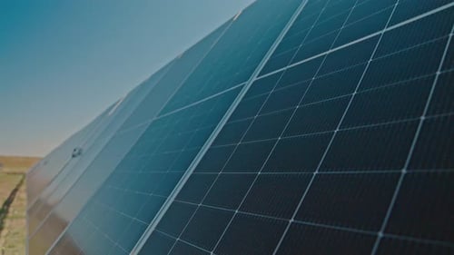 Solar Power Panels Harness Renewable Energy in a Vast Open Field