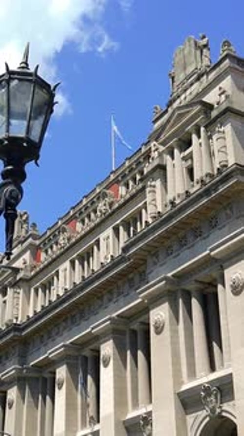 Ornate Building With Flag Waving in Argentina
