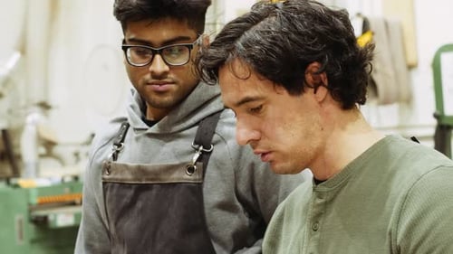 Male Carpenters Talking Brainstorming in Workshop 2024 Years