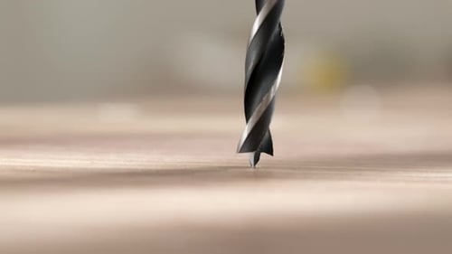 Close View of Drilling Holes in Wood with Drill