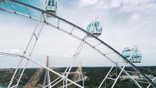 Observing Wheel Rotates with Empty Cabins Aerial View of the Rotating Ferris Wheel