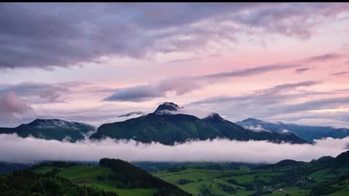 Beautiful Carpathian Mountain Landscape Forest and Mountains Shrouded in Fog at Dusk