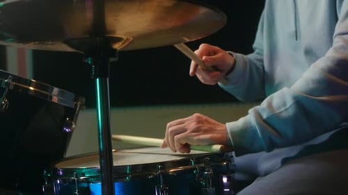Musician Playing Snare Drum and Hihat Cymbal in Recording Studio