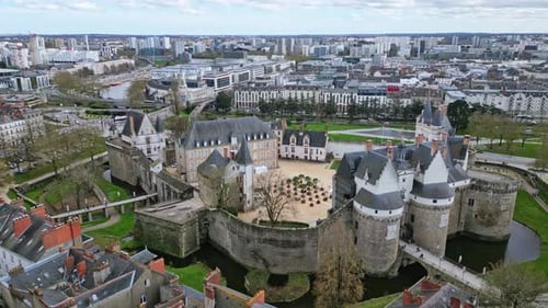 Castle of Dukes of Brittany, Nantes in France. Aerial drone view and cityscape
