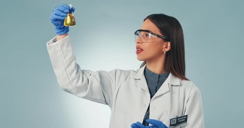 Doctor, perfect and reaction with a science woman in studio on a gray background for research
