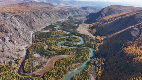 Meandering river in a scenic autumn mountain valley
