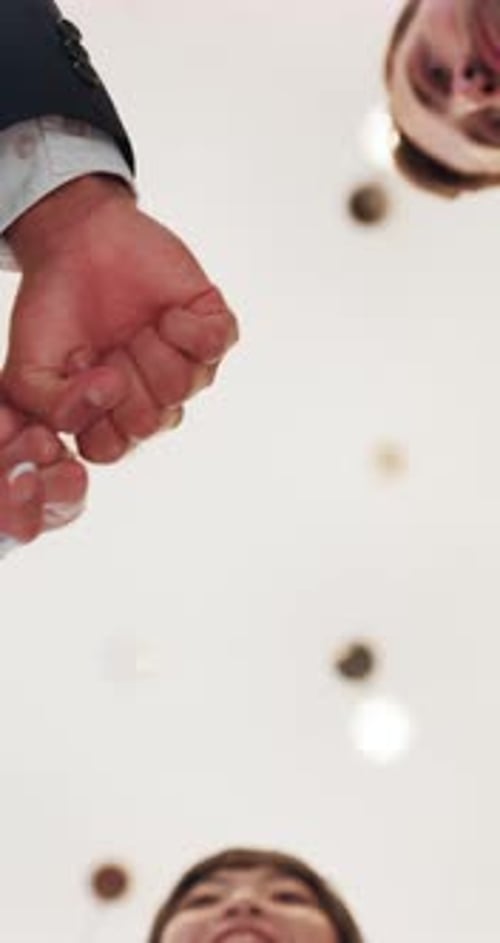 Fist bump, below and hands of business people in office for teamwork, collaboration and partnership