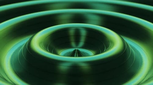 Concentric Metallic Ripples Expanding and Contracting Creating a Mesmerizing Visual Effect Perfect