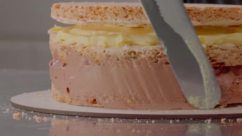 Culinar Applying Aerial Cream on Layers Tart Close Up Shot Glazing Layer Tart Adding More Vanilla