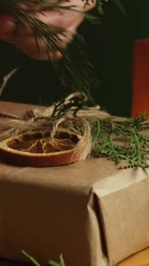 Vertical Video Christmas Gift Wrapping Woman Hands Decorates Christmas Present