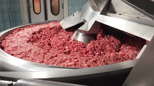 Ground Meat Churning in Large Industrial Mixer