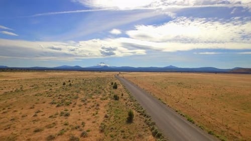 Aerial View of Oregon Road by Mountains Under Blue Sky 2 Above