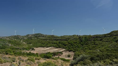 Five Windmills on a Hill Producing Renewable Green Energy