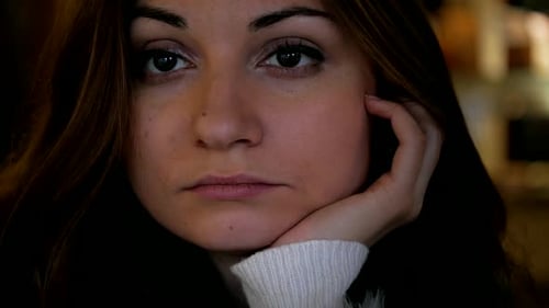Beautiful woman boring at cafe close-up