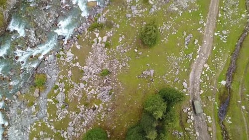 Aerial view of cab vehicle driving on a mountain road