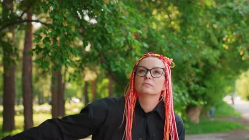 Imagine Serene Outdoor Moment Contemplative Artist in Peaceful Park Setting Individual with Vibrant