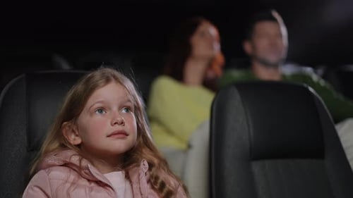 Child Watching a Scary Movie in Theater