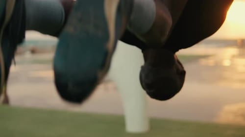 Close-up of the flip on the gymnastic rings, street calisthenic workout