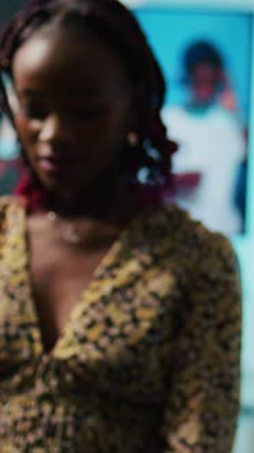 Young Woman Choosing Apparel for Her Fashion Collection