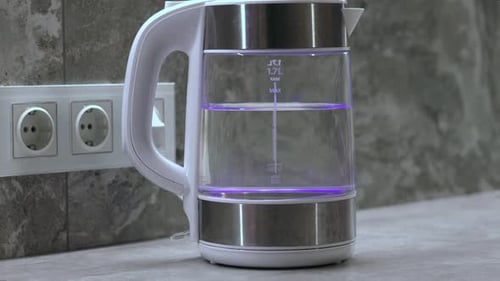 Electric Kettle Being Switched On in Kitchen