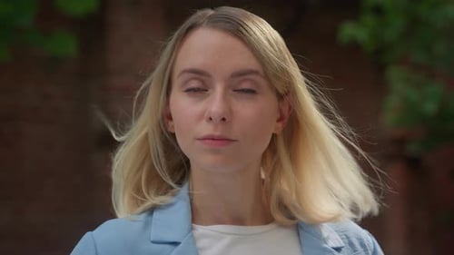 Smiling Blonde Woman Close Up Portrait