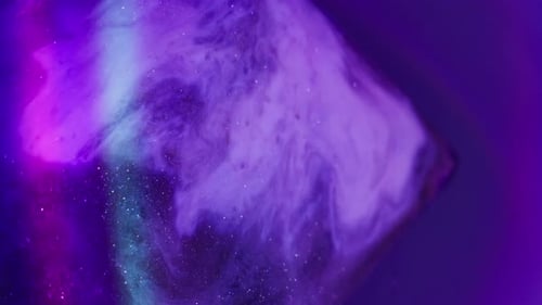 Abstract Footage of Ink Cloud with Glitter Particles