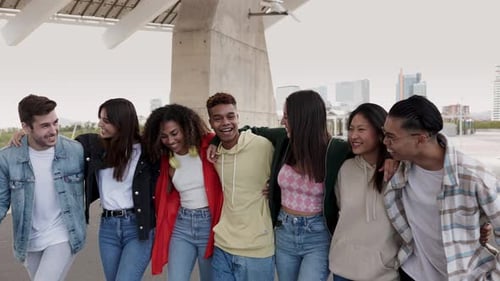 Diverse Group of Friends Laughing Together in City