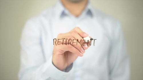 Writing Retirement Plan on Transparent Surface