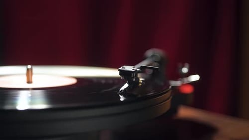 vintage vinyl player on a wooden table. close-up. panorama