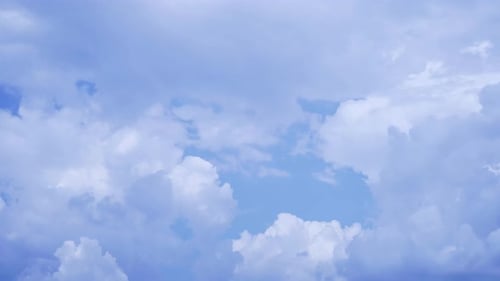 clouds 4k time lapse, beautiful white fluffy clouds moving fast in the summer sky