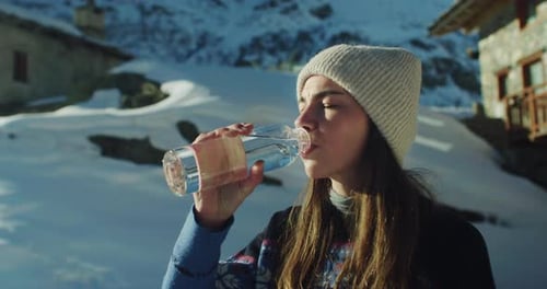 Portrait of Female Tourist Drinking Fresh Pure Cold Water from Natural Spring in Gl