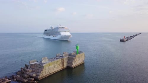 Aerial view of large white cruise liner Seven Seas Splendor arriving at the port of Liepaja (Latvia)
