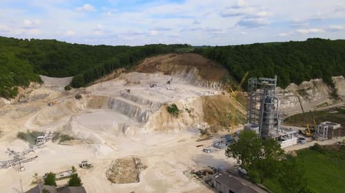 Cement Factory at Open Pit Mining of Construction Sand Stone Materials with Excavators and Dump