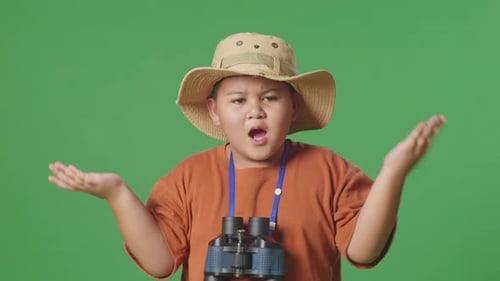 Tourist Boy Researcher Standing Doubtfully Asking Why After Using The Binoculars