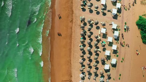 Strong Waves of Turquoise Adriatic Sea Wash Sandy Shore