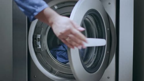 Hand opening commercial washing machine door